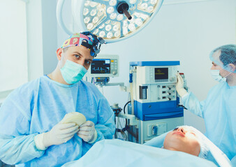 Man surgeon at work in operating room