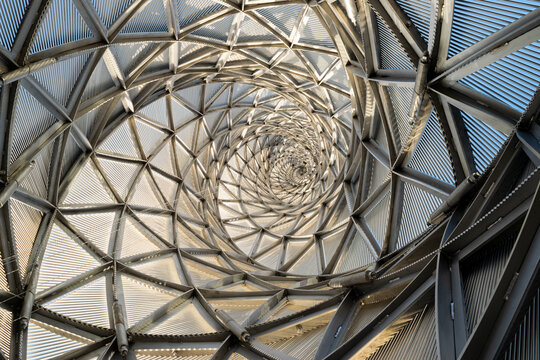 Geometric spiral architecture view from inside low-angle
