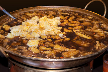 Braised fish maw in red gravy soup. Chinese food.