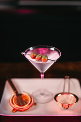 Dry vodka martini details, close up of alcoholic beverage at bar