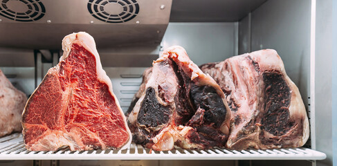 Dry-aged Wagyu beef steak with large fillet in the fridge. The preparation process by let the beef...