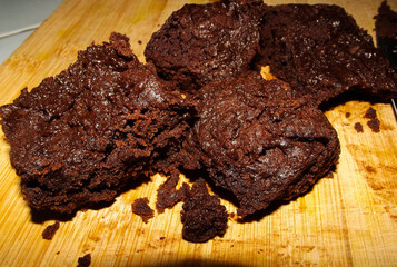 chocolate brownies on a wooden surface, freshly baked
