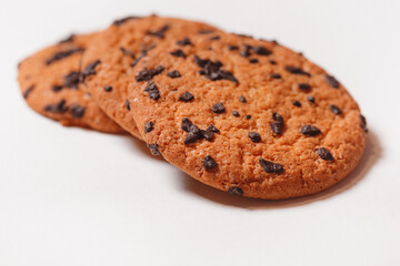 Three Americano cookies with chocolate chips isolated on white background