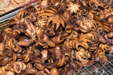 Fried squid with soy sauce.