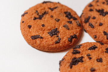 Americano cookies with chocolate chips isolated on white background closeup