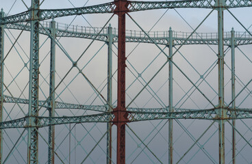 Rusty steel beams from an old and disused gasometer 