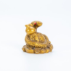 Golden statues ornaments on a white background
