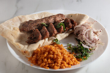 Traditional Adana Kebap with salad