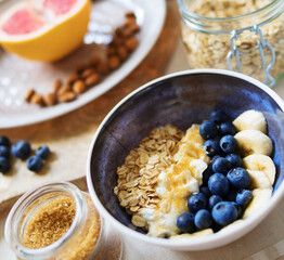 Healthy breakfast with berries, yogurt and oat flakes.