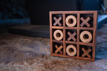 upright tick tack tow game made of wood with copy space