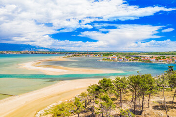 Aerial view of town of Nin and lagoon in Dalmatia, Croatia. Coastline and turquoise water and blue...