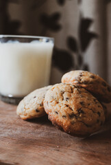 traditional cookies with chocolate and a glass of milk to replenish energy