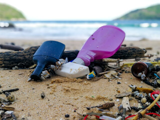 Pollutants and plastic garbages on the beach