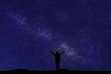 Fototapeta na wymiar person silhouette over night sky background