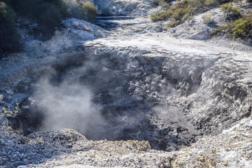 Waiotapu, also spelt Wai-O-Tapu is an active geothermal area at the southern end of the Okataina Volcanic Centre. It is 27 kilometres south of Rotorua.