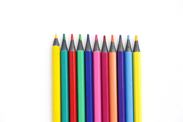 Colored pencils close-up on a white background. Back to school concept. 