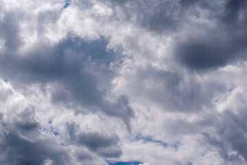 Fototapeta na wymiar rain clouds in a blue sky for backdrop background