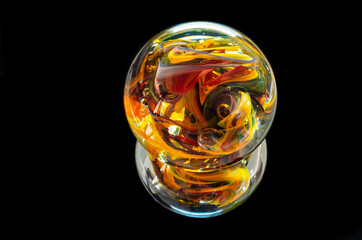 decorative glass paperweight on black