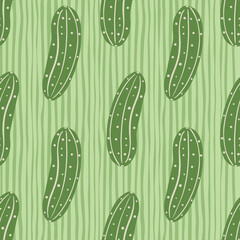 Green cucumber seamless pattern on stripes background. Cucumbers vegetable endless wallpaper.