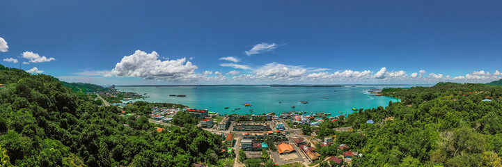 An aerial panorama view of Sandakan Town at Sabah. Sandakan is a city in the Malaysian state of Sabah, on the northeast coast of Borneo. 