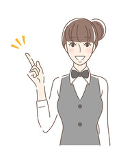 笑顔で指をさす正面向きの女性