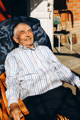 Portrait of a cheerful elderly farmer.
