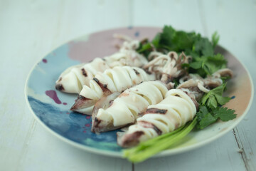 Steamed squids or Octopus on dish.
