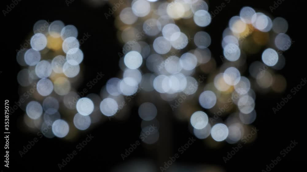 Poster soft defocused new year holidays light abstract background with bokeh balls, out of focus flashing c