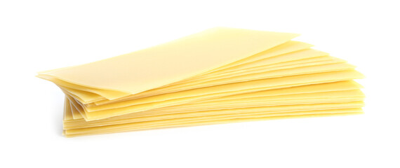 Stack of uncooked lasagna sheets isolated on white