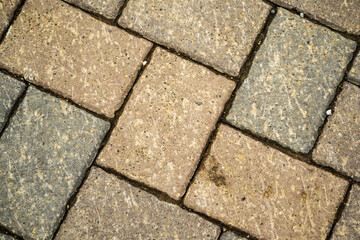 Cubical stone background. Cubical stone pavement on the street.