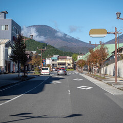 Street view at midtown of Nikko on mountain and clear blue sky background with copy space , Japan