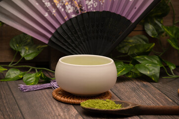 Green matcha tea in Japanese tea set