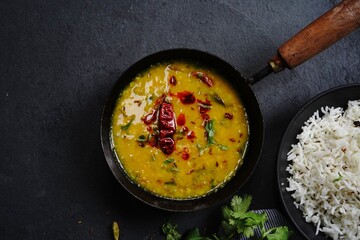 Dal Tadka /Daal fry-Indian lentil curry with Jeera rice - obrazy, fototapety, plakaty