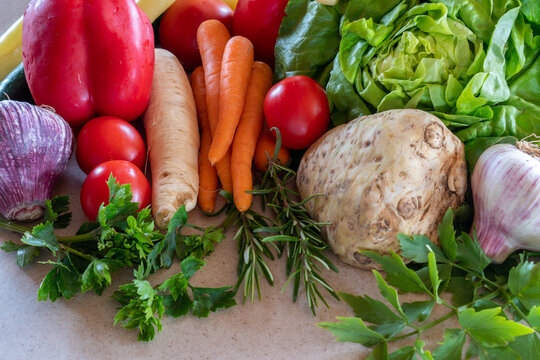 Close up of various colorful fresh raw vegetables. Flat lay. On kitchen table.