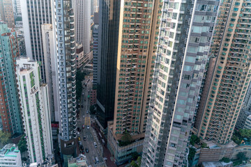 The amazing view of Hong-Kong cityscape full of skyscrapers from the rooftop.