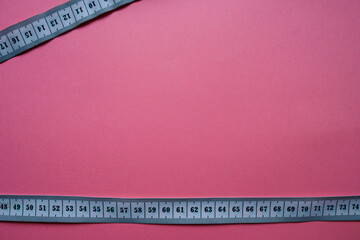 White centimeter tape on paper background. Free Space. Lost Weight concept