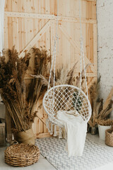 White wicker swing chair, cute interior, handmade