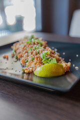 Close-up view on plate with fried rice and seafood