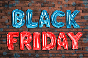Phrase BLACK FRIDAY made of foil balloon letters against brick wall