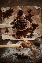 
wooden spoons with coffee beans and cinnamon