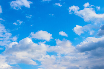 Obraz na płótnie Canvas Blue sky with white clouds in sunny weather