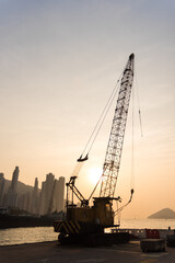 crane at sunset - 353883895