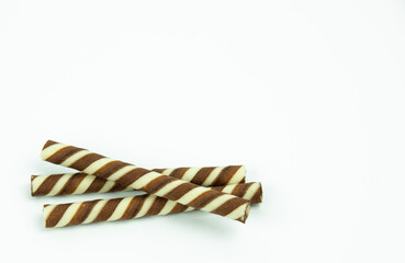 The two-tone wafer roll stick chocolate flavor on white background.