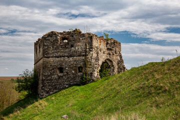 Fototapeta na wymiar Remains and ruins of an old castle in Europe. UNESCO heritage