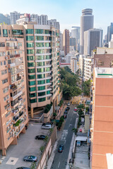The amazing view of Hong-Kong cityscape full of skyscrapers from the rooftop.