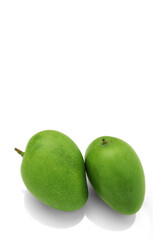 Obraz premium Green mango isolate on white background,fresh green mango,two mango