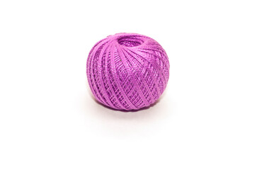 A ball of purple yarn for crocheting or knitting on a white background. Isolated