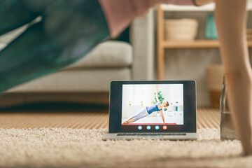 woman doing exercises at home