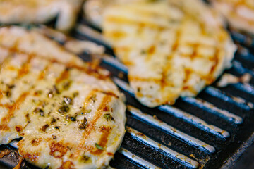 Delicious pork tenderloin cooked on the grill with oil and spices. Real Food.