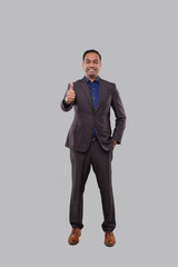 Businessman Showing Thump Up Isolated. Indian Man Standing Full Lenght